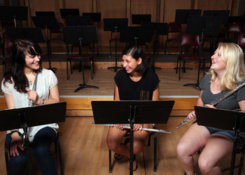 Students playing North Bridge flutes
