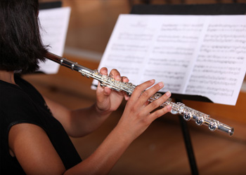 Students playing North Bridge flutes