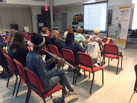 The attendees play along with Paul