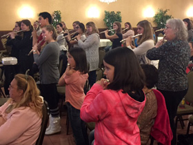 60 kids play along with Paul in Elkhorn.