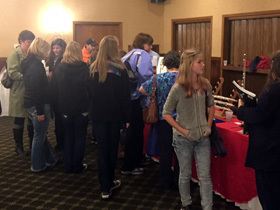 Elkhorn students try flutes after the event