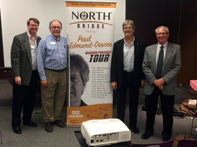 he team at Schmitt Music in Omaha pose with Paul